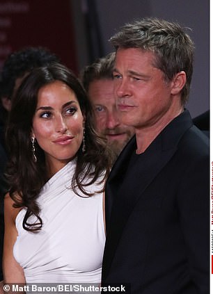 Ines de Ramon and Brad Pitt appear at the premiere of Wolfs