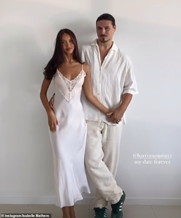 Isabelle shared a clip of herself strutting seductively backwards in front of the camera in her wedding dress as her partner, model Harri Musumeci, looked on