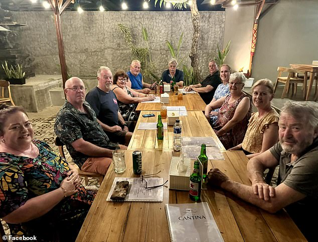 Mr. Phillips is pictured dining with other members of the club on Sunday evening