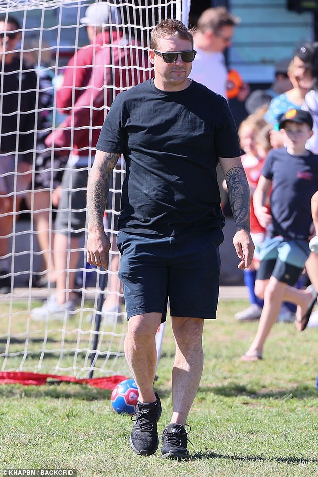 Stuart completed his casual look with black sneakers while showing off the half-tattooed sleeve on his left arm