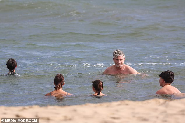 The windy weather didn't stop the Hughes family, who enjoyed spending some quality family time in the water