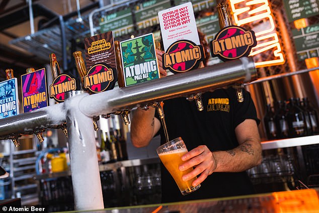 The pub announced the closure with 'a heavy heart' and said the last few years had been 'incredible' (pictured a staff member pouring an Atomic Beer)