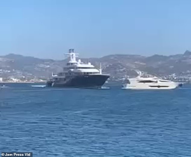 This is the shocking moment a 300ft superyacht collides with another boat