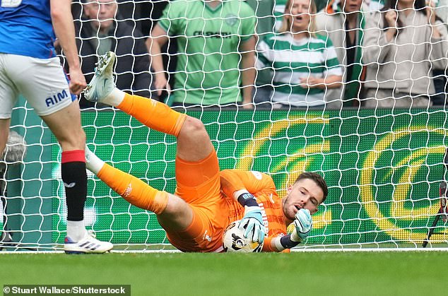 Butland takes a shot from the Celtic attack as Rangers come under intense pressure