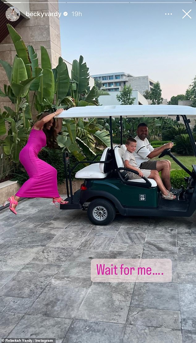 The WAG, 42, looked stunning in a pink bodycon dress and brightly coloured heels as she hung out with her children in the photos