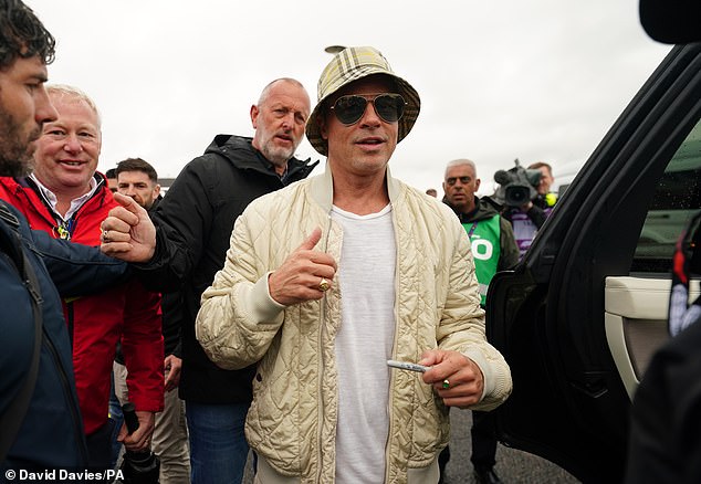 In July, Brad made a statement in a £320 Burberry bucket hat at the Grand Prix, bringing back the '90s trend and proving his generation could also rock the Gen Z-favourite accessory