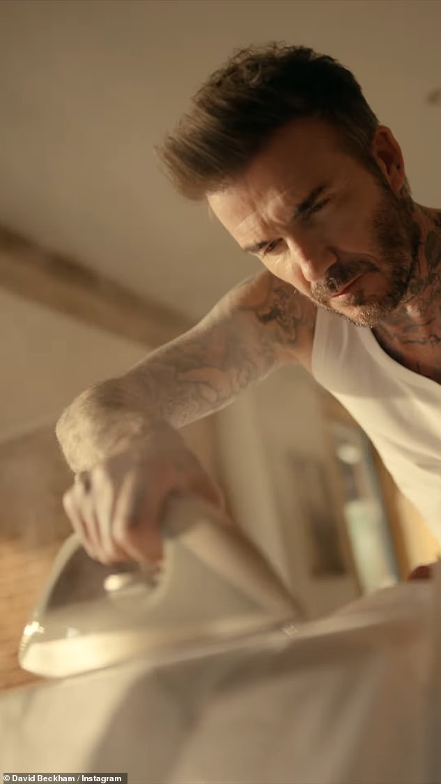 In the clip, the Inter Miami CF co-owner is steaming a white shirt while showing off his tattoos in a white vest