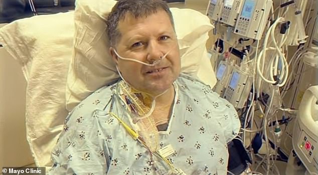 After being diagnosed with an aortic aneurysm, he was rushed into open heart surgery. He is pictured above before the procedure