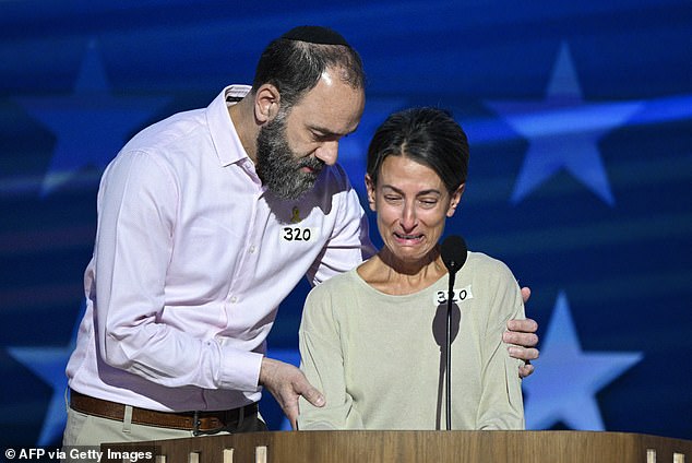 His parents Jon Polin and Rachel Goldberg-Polin, pictured at the DNC 12 days ago, confirmed his death in a statement on Sunday, hours after the Israeli military said it had found bodies in Gaza. They said: 'With broken hearts, the Goldberg-Polin family is devastated by the passing of their beloved son and brother, Hersh. The family thanks all of you for your love and support and requests your privacy at this time.'