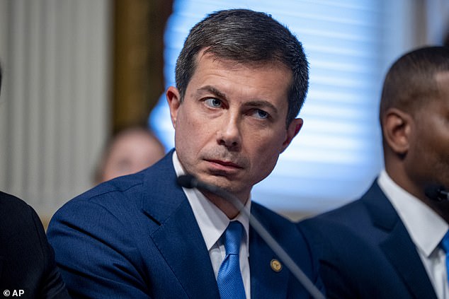 Transportation Secretary Pete Buttigieg attends President Joe Biden's speech on supply chain issues