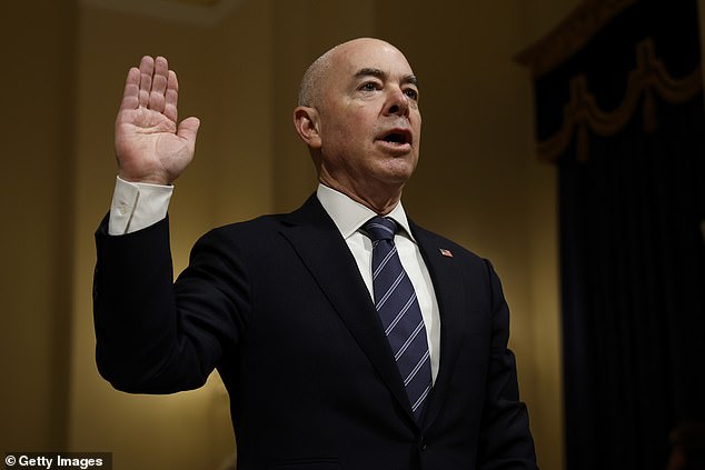 U.S. Secretary of Homeland Security Alejandro Mayorkas is sworn in before testifying before the House Committee on Homeland Security