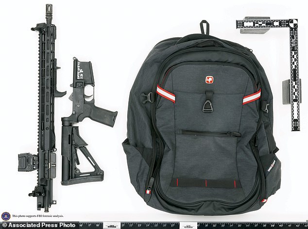 This image from the FBI shows Thomas Matthew Crooks' rifle, which is broken, as likely occurred during transport, and the backpack found at the crime scene in Butler, Pennsylvania, on July 13, 2024.