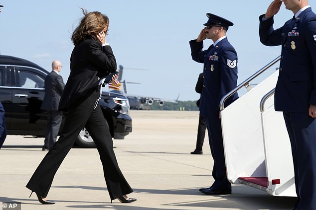 The vice president boarded Air Force One with headphones on and her phone in her hand as she prepared for another battle with just nine weeks until Election Day