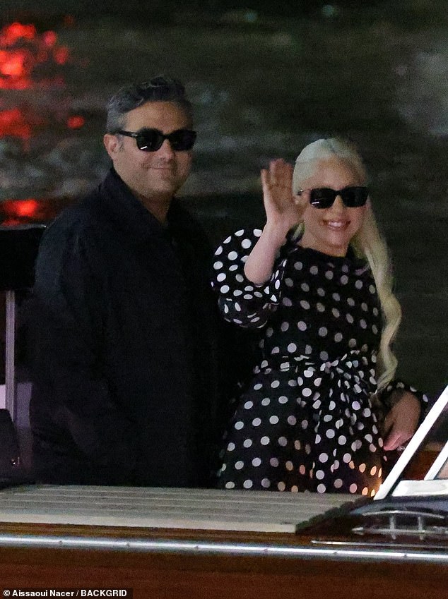 With a smile on her face, Gaga waved to her adoring fans