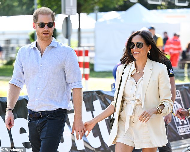 Harry and Meghan attend the cycling medal ceremony at the velodrome during day six of the Invictus Games in Düsseldorf, Germany, in 2023