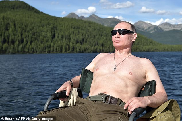 Russian President Vladimir Putin sunbathes during his vacation in the remote Tuva region of southern Siberia. The photo was taken between August 1 and 3, 2017. The Russian leader is currently 71 and will remain in office until 2036, when he will be well into his 80s.