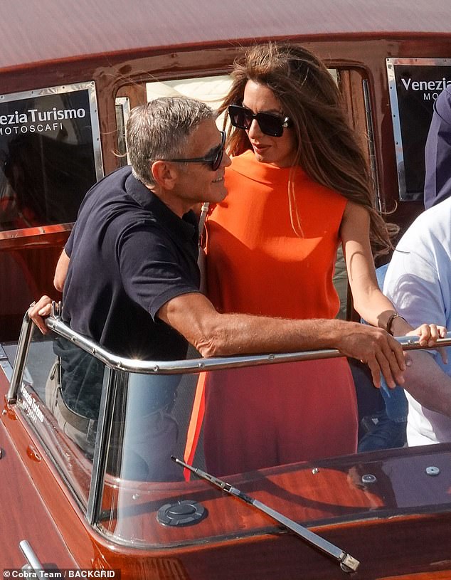 The couple looked at each other in admiration as they walked back from the festival