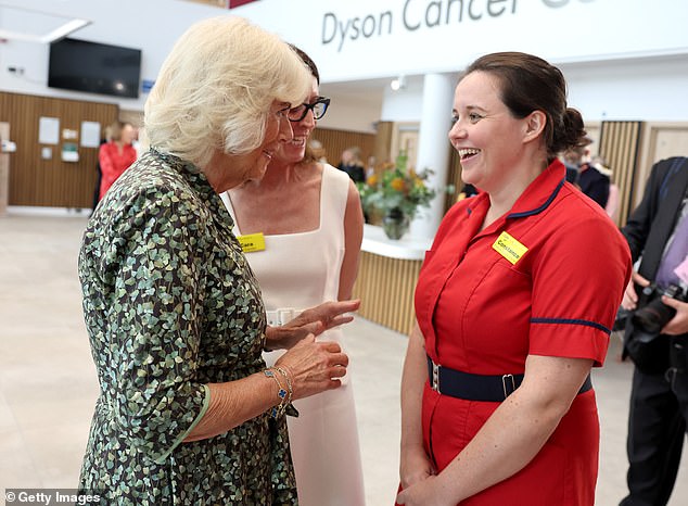 Her Majesty is today touring The Royal United Hospital in Bath, which will provide cancer care to more than 500,000 people in the South West. She is pictured speaking to staff