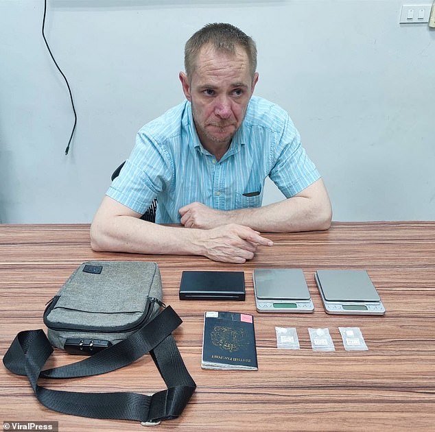 Stephen Mullady, 45, from Ascot, Berkshire, was drinking with friends when police raided his hotel room on the chic island of Phuket on March 18.