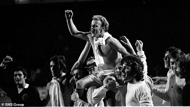 Bremner is held aloft by his Scotland teammates after they beat the Czechs to move to 74th place at the World Cup