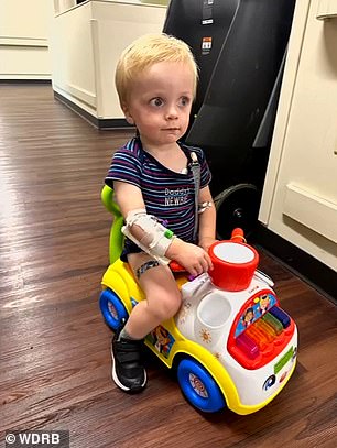 Henry Burkett is a 21-month-old boy who lives in Kentucky with his parents Ian and Beth