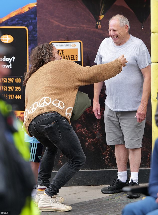 Russell was in good spirits as he mingled with fans during the outing