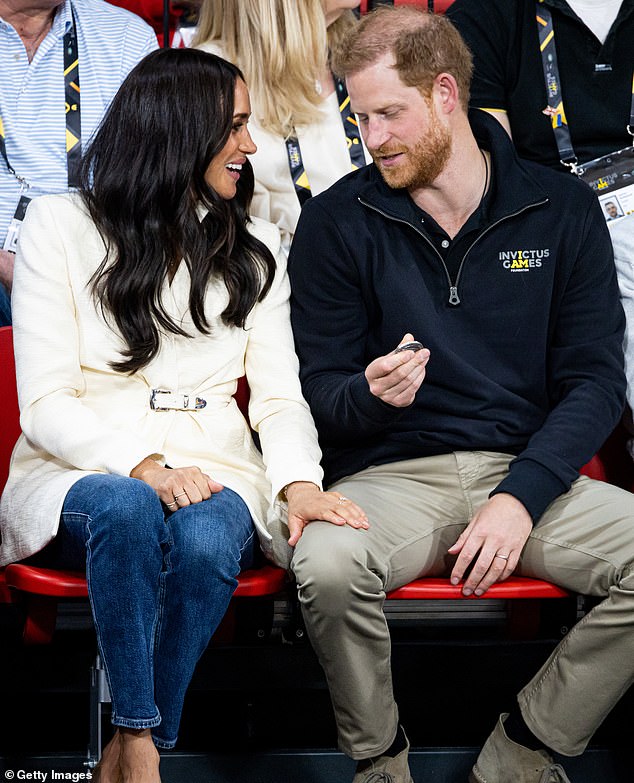 Harry and Meghan attend the volleyball tournament on the second day of the Invictus Games in April 2022