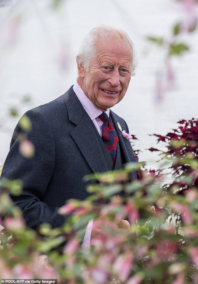 King Charles III smiles during a visit to the Royal Horticultural Society of Aberdeen's 200th Flower Exhibition on August 31 this year