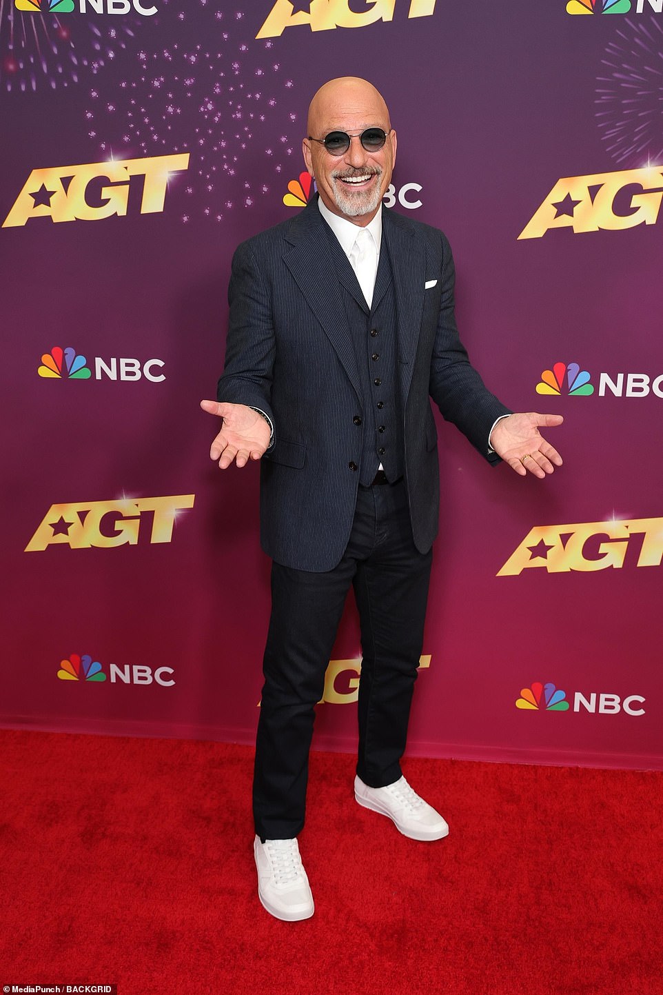 Judge Howie Mandel looked chic in a tailored jacket, skinny pants and bright white loafers