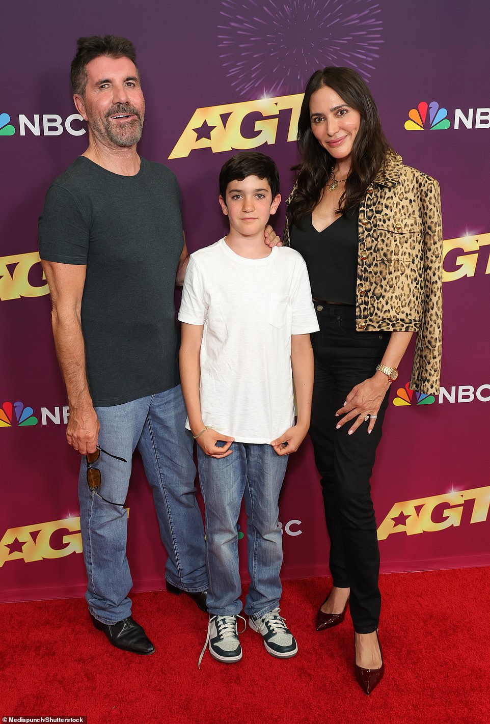 Judge Simon Cowell, 64, made it a family affair by walking the red carpet with his son Eric Cowell, 10, and his fiancée Lauren Silverman, 47.