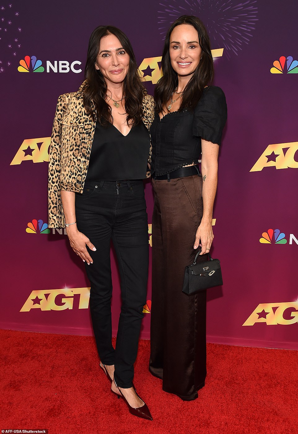 The 50-year-old reporter looked effortlessly stylish in brown satin trousers and a low-cut blouse as she hung out with Simon Cowell's fiancée Lauren Silverman