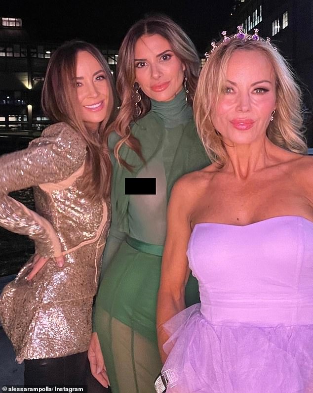 However, her decision to go braless that night meant her nipple was visible through the sheer fabric as she posed for photos with her girlfriends