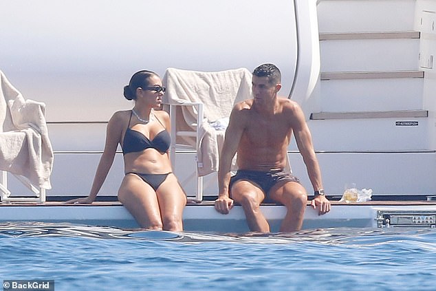 1725449452 269 Georgina Rodriguez cheekily grabs her bottom in front of Cristiano