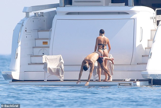 1725449455 304 Georgina Rodriguez cheekily grabs her bottom in front of Cristiano