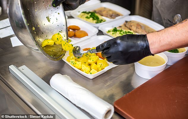 It is against Australian food safety laws to have live animals near places where food is processed and where food is served (below is a stock photo of a chef serving takeaway food).