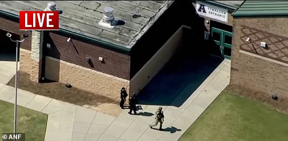 13812827 Georgia school on lockdown amid reports of 'active shooter' - Apalachee High School in Barrow County, GA - https://www.atlantanewsfirst.com/2024/09/04/massive-police-presence-seen-apalachee-high-school-barrow-county/