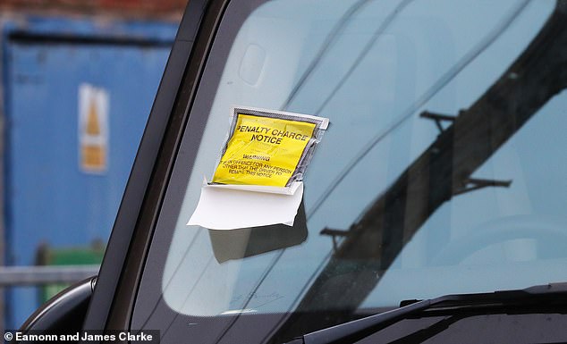 Molly-Mae's car was spotted with a parking ticket on Wednesday as she walked to her office with Anouska, owner of an accessories brand