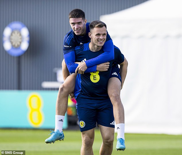 Lawrence Shankland, pictured with Max Johnston, is another candidate for the striker role