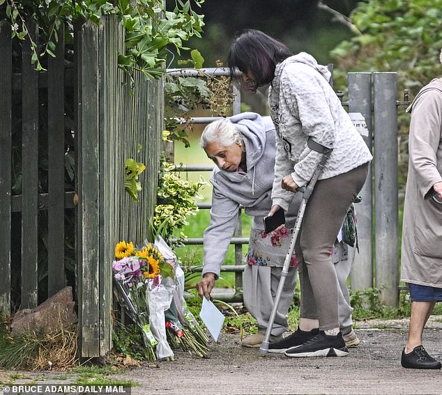 Mr Kohli's wife, 73-year-old Satinder, was seen laying flowers at a memorial near the spot where he died