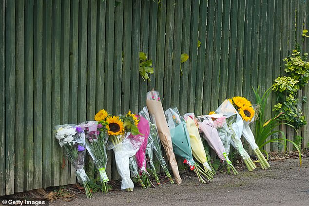 Flowers and tributes to Bhim Kohli are left at the Bramble Way entrance to Franklin Park on September 4, 2024 in Leicester, England