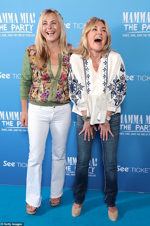 She looked to be in high spirits as she posed for a photo with fellow presenter Philippa Forrester, 55, who nailed the rustic beach look in white flared trousers and a green floral jacket