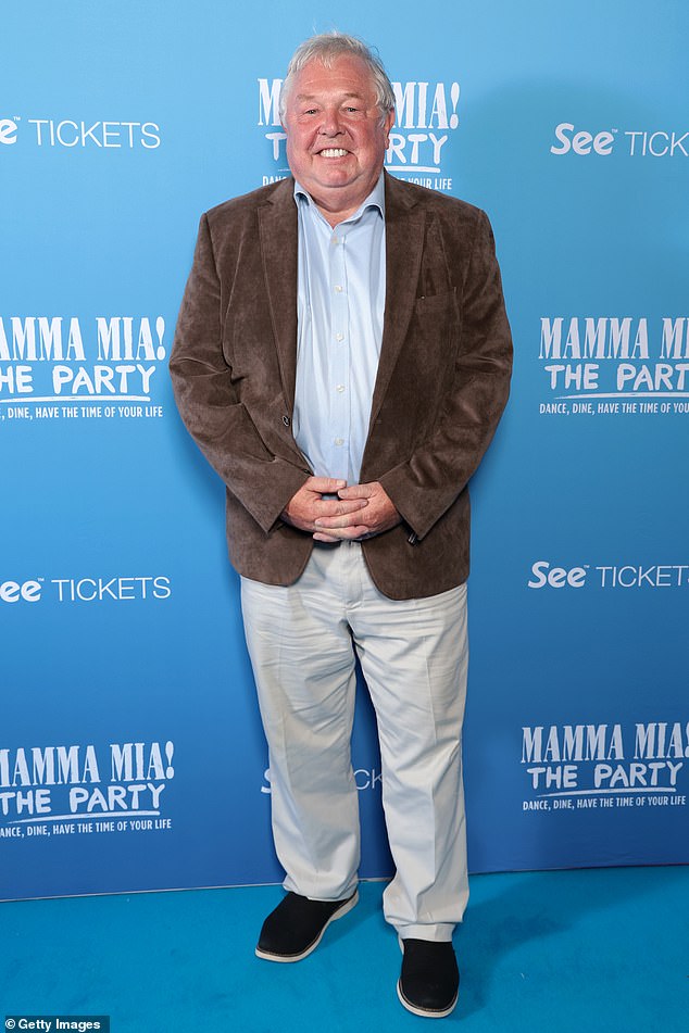 Radio host Nick Ferrari, 65, put on a tough show in a fanned blazer, blue shirt and blue trousers