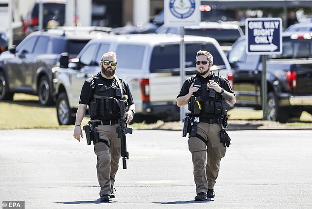 Police first received reports of the high school shooting around 10:20 a.m. ET