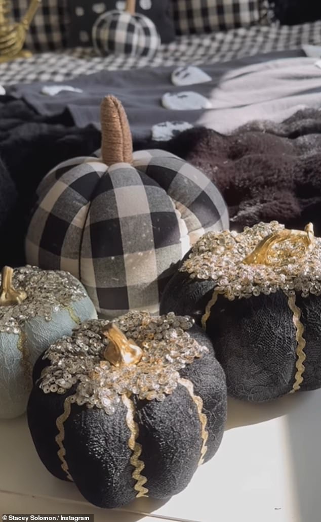 Scattered across the bed was an array of black and white fabric pumpkins, which cost £12 for a pack of five