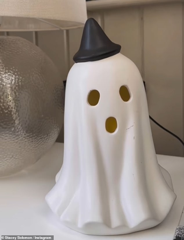 The TV personality also decorated her bedside table with a ghost ornament - priced at £10 for three