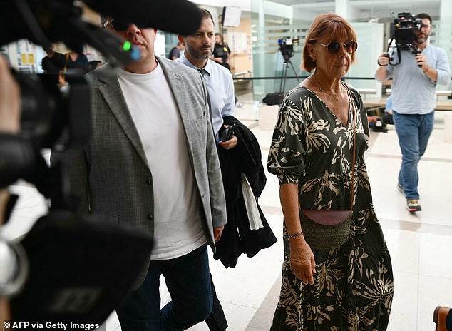 Gisele Pelicot arrives at court Monday during the trial of her husband Dominique, who is accused of drugging her for nearly a decade and inviting 50 strangers to rape her at their home in the south of France.