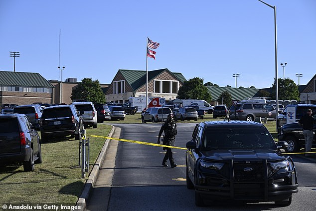 Security forces take action at the scene of the mass shooting at Apalachee High School in Winder, Georgia