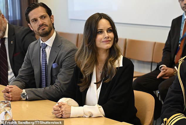 Sofia looked sweet and demure as she stood next to her husband, her hands folded as she listened to the staff