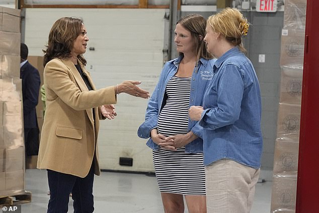 Harris meets Suzanne Foley and her daughter Eileen Marousek of Port City Pretzels during her campaign in Portsmouth, NH