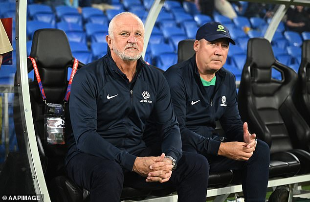 Socceroos fans said coach Graham Arnold (left) was to blame for the defeat